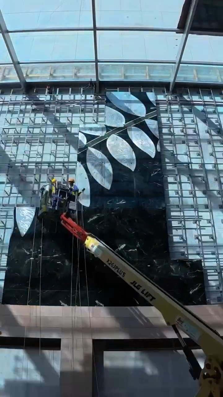 The installation of Hamra Abbas’ Tree Studies 32: Marble Mosaic is currently underway at Saadiyat Grove.